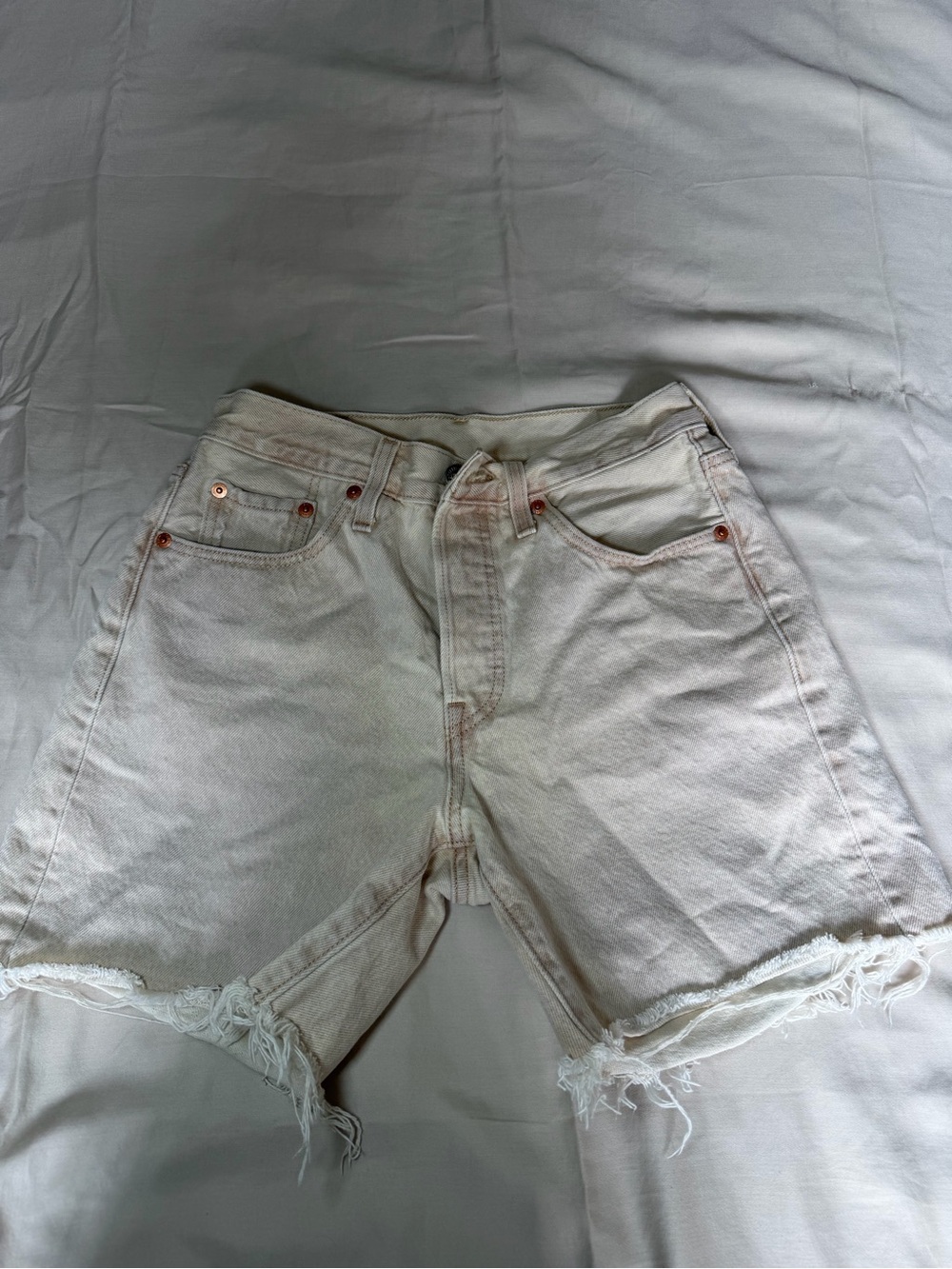 Levi's Light Cream Frayed Hem Denim Shorts